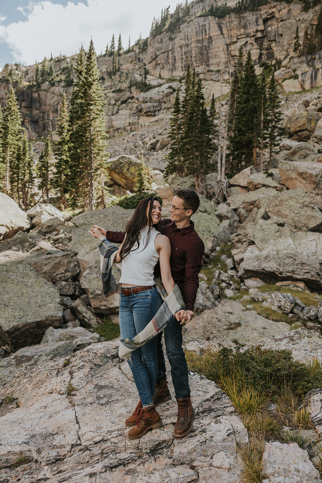 couples engagement photos in the outdoors with waterfalls and beautiful views