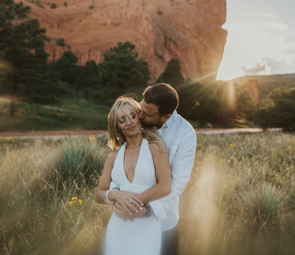 Bride and groom posing for Colorado elopement photoshoot 