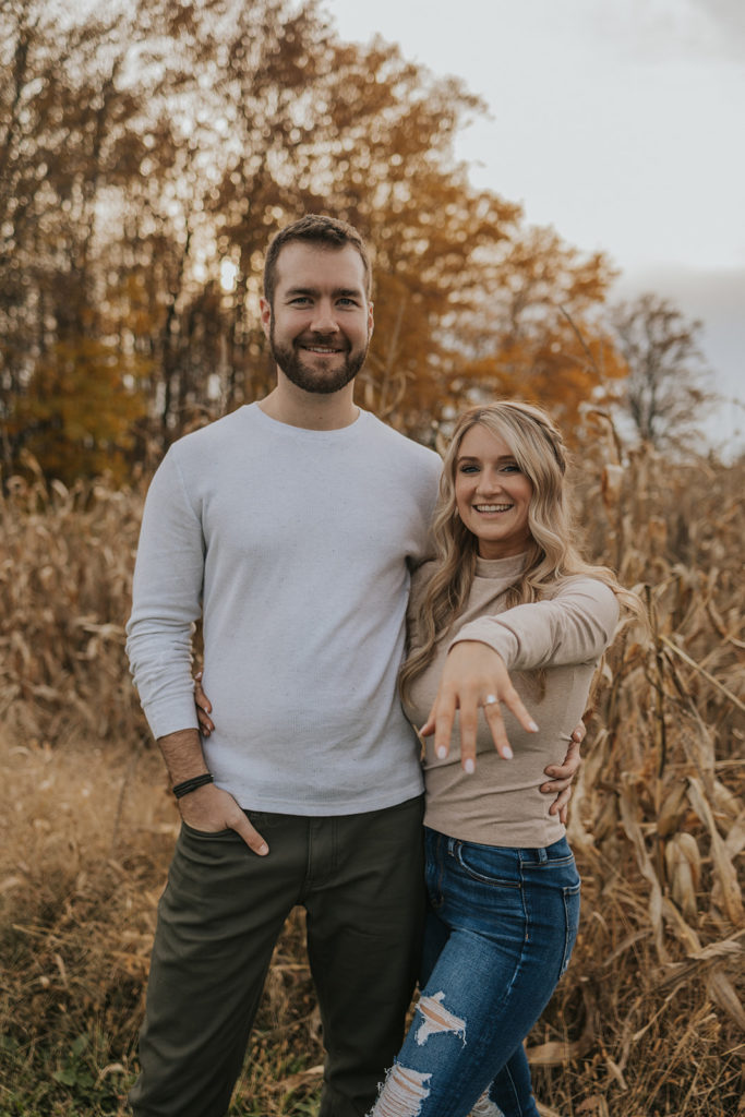 Woman showing off engagement ring during photoshoot